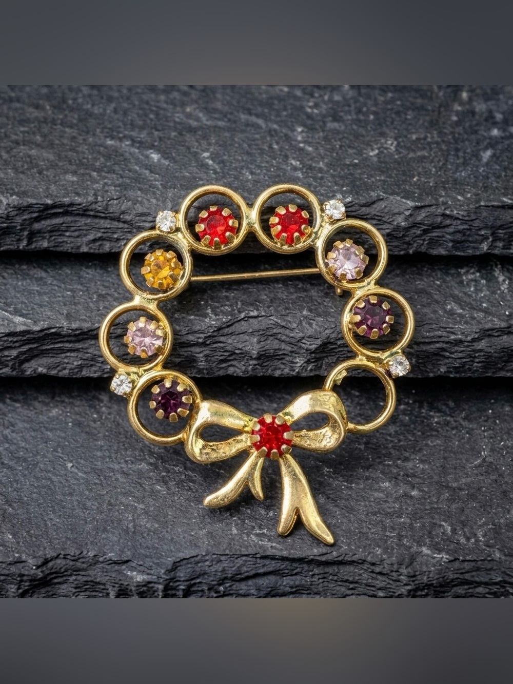 Vintage 60s Multicolor Rhinestone Open Circle Ring Ribbon Bow Gold Tone Brooch